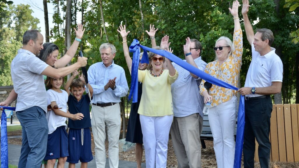 Ribbon cutting for Wade Barber Park dedication ceremony. 